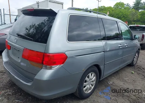 2010 Honda Odyssey Ex-L z USA, uszkodzony, nr VIN 5FNRL3H60AB085658